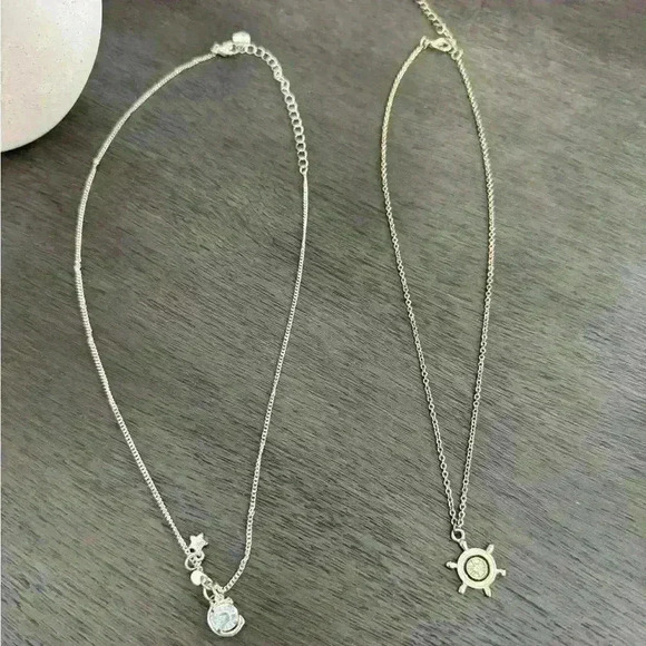 Accessories - 2 piece set of  woman’s necklaces and charms